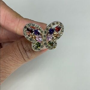 Silver ring butterfly shape.
